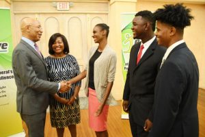 Their Excellencies Sir Patrick Allen and Lady Allen congratulate the top three winners in the 2017 I Believe Initiative Summer Of Service Competition. L-R: Ms. Leneka Rhoden (1st), Mr. Vashawn Saxton (2nd) and Mr. Timothy Simmonds (3rd).