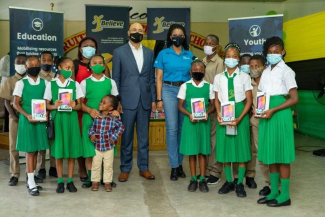 HE, Flow Foundation Manager, Mrs. Kayon Mitchell, teacher and students Fruitful Vale